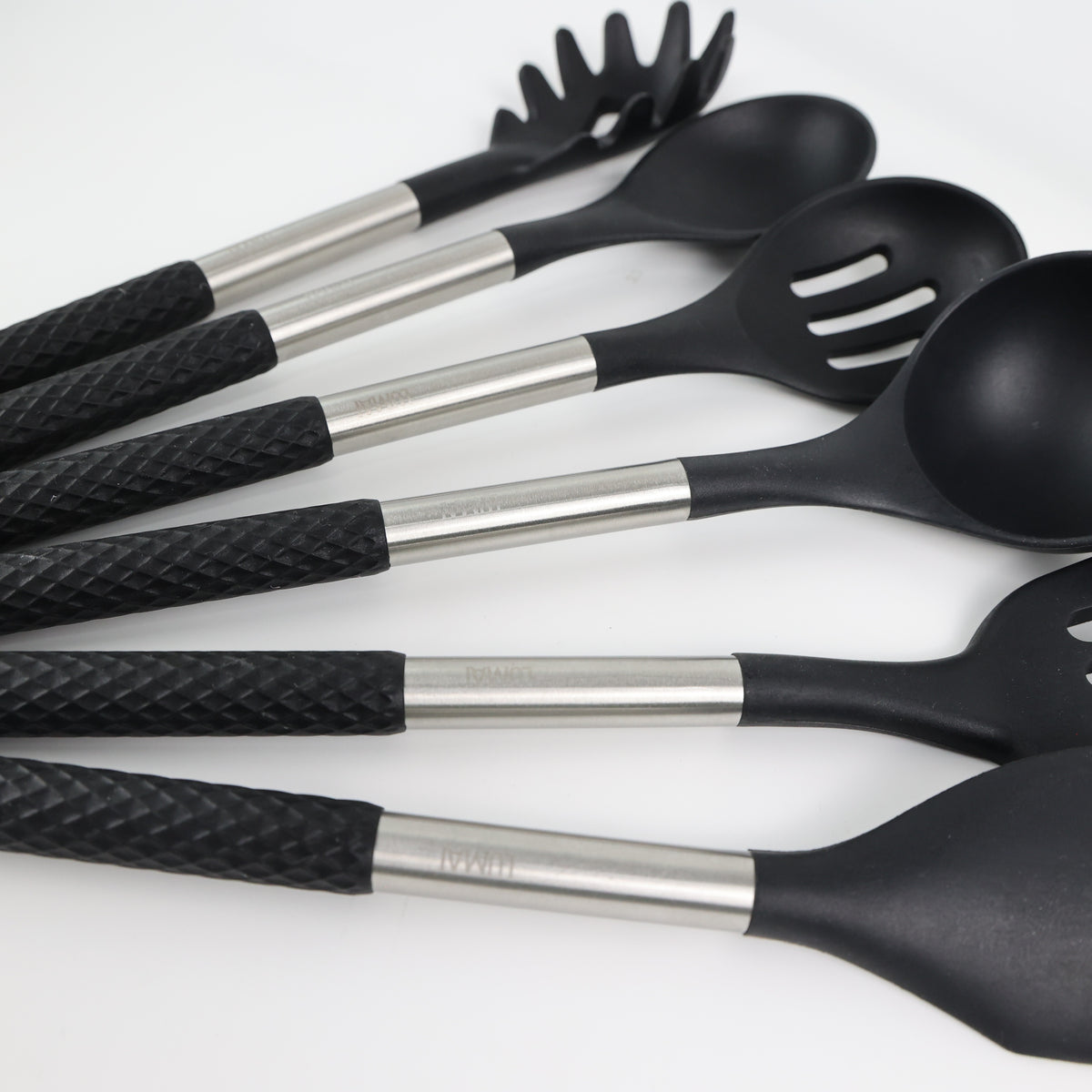 Pontas de silicone preto e cabos de inox dos utensílios Berlim