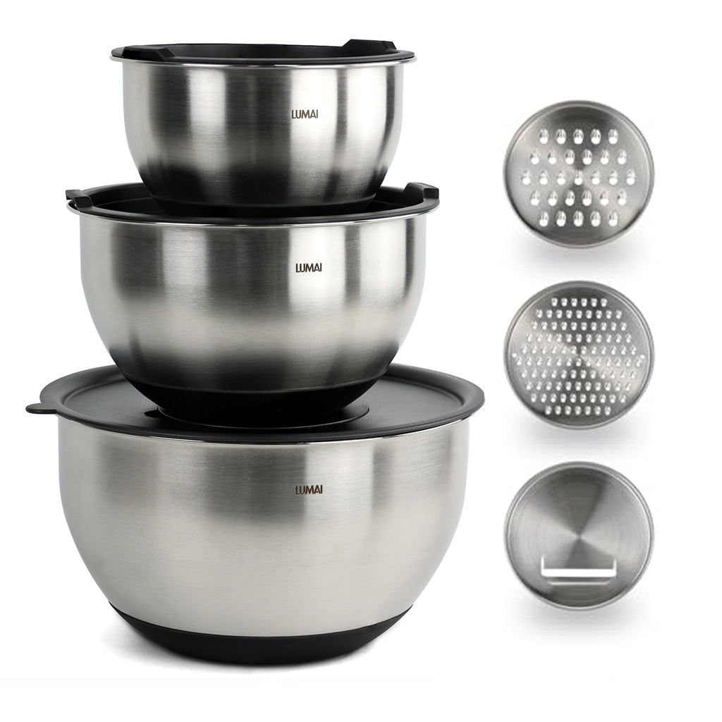 Foto de produto do Kit de Tigelas de Inox LUMAI com 3 peças, tampas pretas e discos raladores inclusos, exibidos sobre fundo branco.